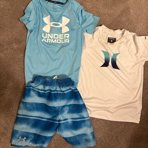 Boys swim set. 2 shirts. One shorts.